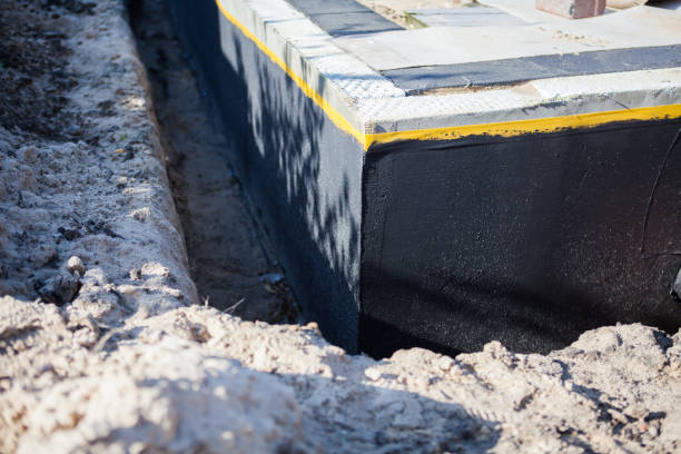 Professional Interior Drainage System technician working in Hancock, MI